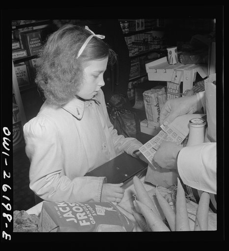 Buffalo, New York. Beverly Ann Grimm, eleven, leaving the store after making the family purchases from a list left that morning by her twenty-six year old widowed mother who is a crane operator at Pratt and Letchworth. Here she submits ration coupons to the grocer for what she has purchased