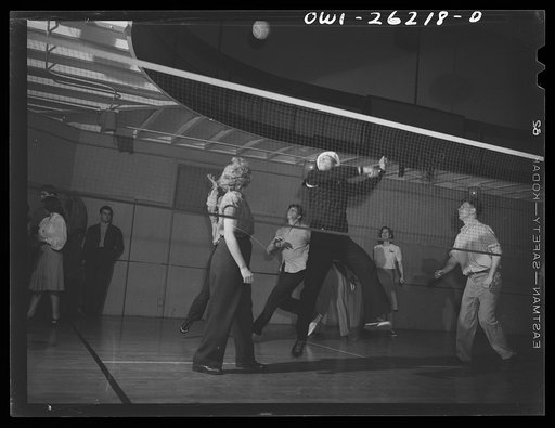 Buffalo, New York. Playing volleyball at Young Women's Christian Association (YWCA) coeducational recreation program for third shift and swing shift workers from 9 a.m. to 1 and midnight to 5 a.m.; includes sports, singing and dancing