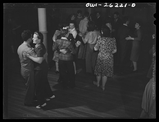 Untitled photo, possibly related to: Buffalo, New Yorl. Young Women's Christian Association (YWCA) coeducational recreation program for the third shift and swing shift workers from 9 a.m. to 1 and midnight to 5 a.m. includes sports, singing and dancing