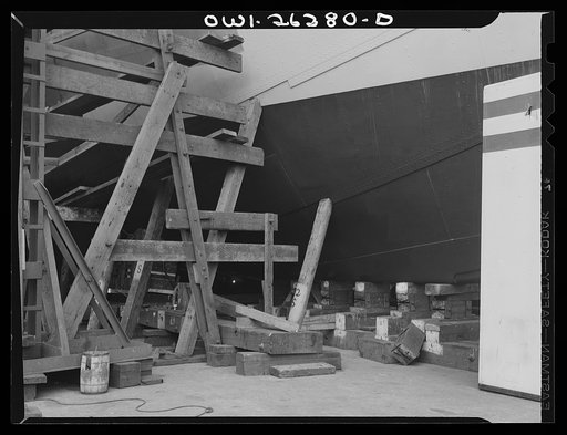 Bethlehem-Fairfield shipyards, Baltimore, Maryland. Preparations for launching a ship. Keel blocks in forward part of the ship