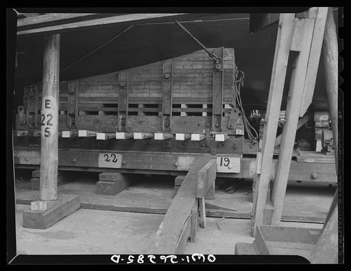 Bethlehem-Fairfield shipyards, Baltimore, Maryland. Preparations for launching a ship. Cradle upon which ship will ride down the ways