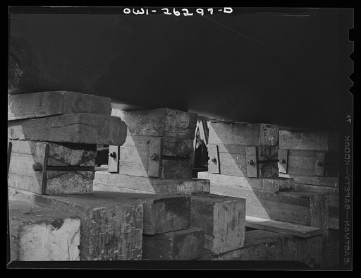 Bethlehem-Fairfield shipyards, Baltimore, Maryland. Preparations for launching a ship. Keel blocks underneath the ship