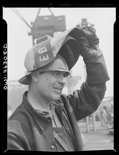 Bethlehem-Fairfield shipyards, Baltimore, Maryland. Portrait of a welder