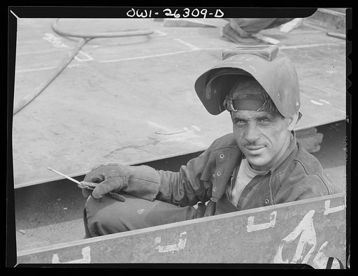 Bethlehem-Fairfield shipyards, Baltimore, Maryland. Portrait of a welder