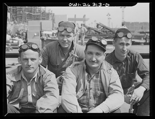 Bethlehem-Fairfield shipyards, Baltimore, Maryland. A group of workers with their safety goggles