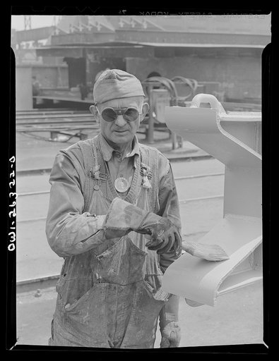 Bethlehem-Fairfield shipyards, Baltimore, Maryland. Ship painter