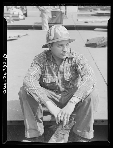 Bethlehem-Fairfield shipyards, Baltimore, Maryland. Shipyard worker resting