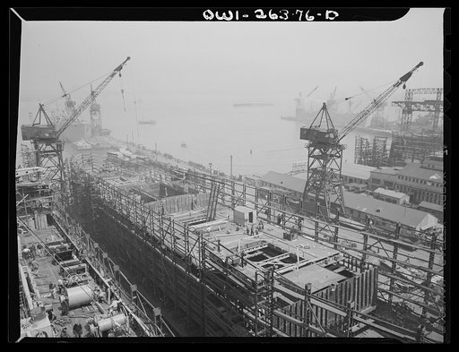 Bethlehem-Fairfield shipyards, Baltimore, Maryland. A ship in the middle stage of construction