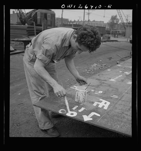 Bethlehem-Fairfield shipyards, Baltimore, Maryland. Painting identification numbers on the steel plates