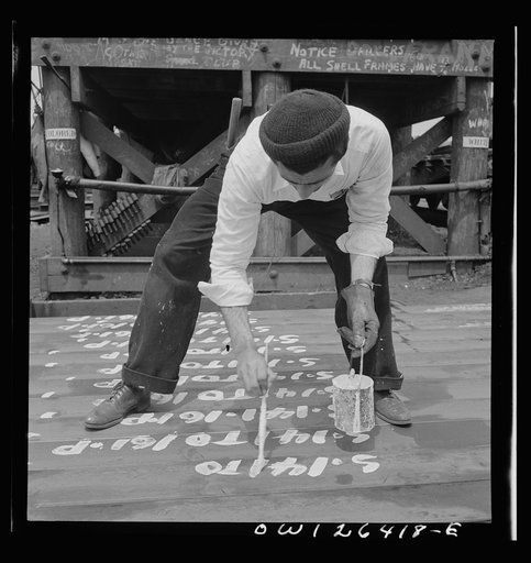 Bethlehem-Fairfield shipyard, Baltimore, Maryland. Painting identification numbers on steel plates