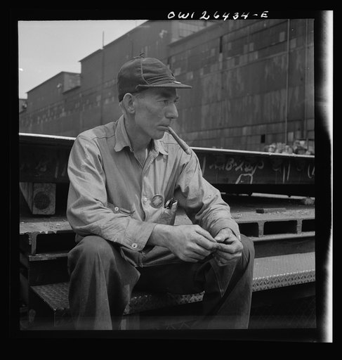 Bethlehem-Fairfield shipyards, Baltimore, Maryland. Worker resting during lunch hour