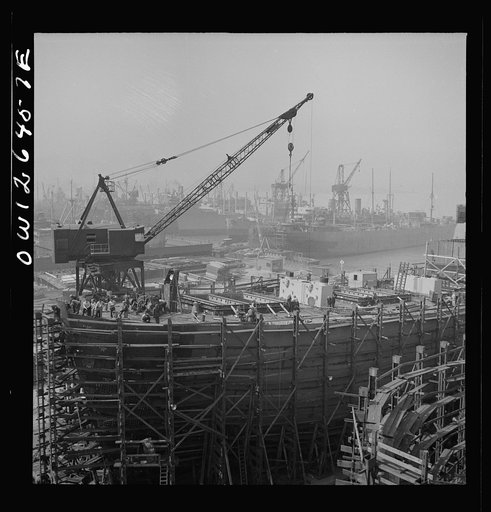 Untitled photo, possibly related to: Bethlehem-Fairfield shipyards, Baltimore, Maryland. A shipyard with a crane