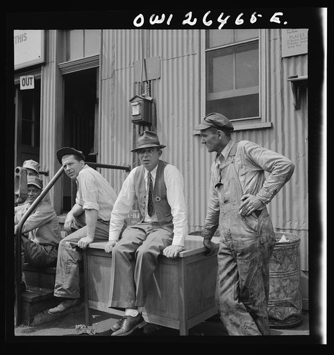 Bethlehem-Fairfield shipyards, Baltimore, Maryland. Workers and their foreman during the lunch hour