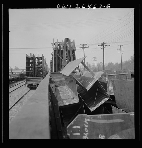 Bethlehem-Fairfield shipyards, Baltimore, Maryland. Steel sections on railroad cars