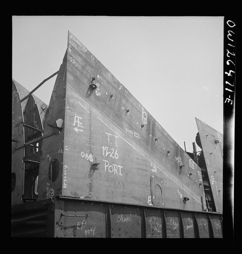 Bethlehem-Fairfield shipyards, Baltimore, Maryland. Port section on a freight car