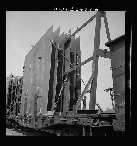 Bethlehem-Fairfield shipyards, Baltimore, Maryland. Method of attaching steel sections to a flatcar