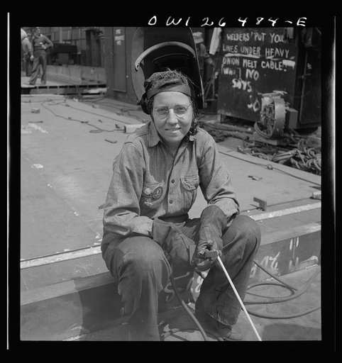 Bethlehem-Fairfield shipyards, Baltimore, Maryland. A girl arc welder