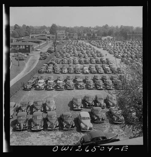 Untitled photo, possibly related to: Pimlico racetrack, near Baltimore, Maryland. Parked cars at Pimlico in spite of gas ration