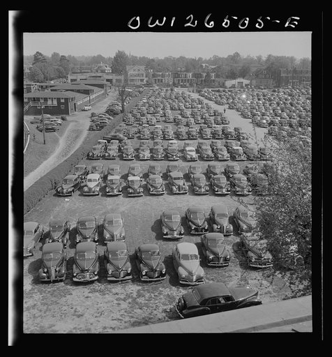 Untitled photo, possibly related to: Pimlico racetrack, near Baltimore, Maryland. Parked cars at Pimlico in spite of gas ration