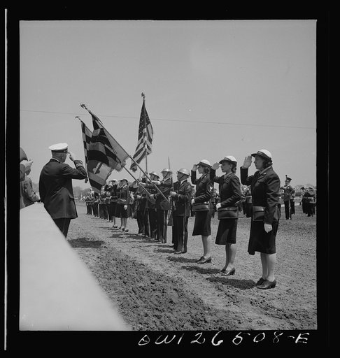 Pimlico racetrack, near Baltimore, Maryland. Maryland home guards and Waves forming flag unit