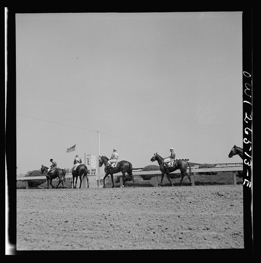 Pimlico racetrack, near Baltimore, Maryland. Parading to the post