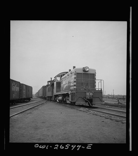Cicero, Illinois. Switching cars with a diesel switch engine at the Clyde yard of the Chicago, Burlington and Quincy Railroad
