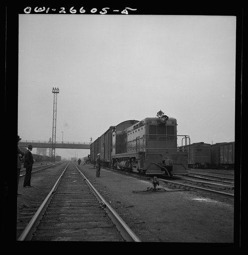 Switching a train with a diesel switch engine on the Chicago and Rock Island Railroad
