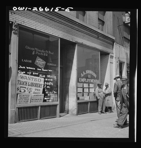 Chicago, Illinois. Railroad help wanted signs in window of an employment agency near the Union Station