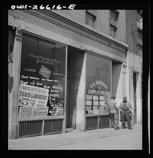 Untitled photo, possibly related to: Chicago, Illinois. Railroad help wanted signs in window of an employment agency near the Union Station