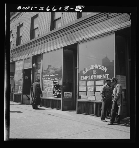 Chicago, Illinois. Railroad help wanted signs in windows of an employment agency near the Union Station