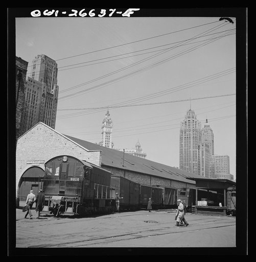 Untitled photo, possibly related to: Chicago, Illinois. Diesel switch engine working at the South Water Street, Illinois Central Railroad freight terminal