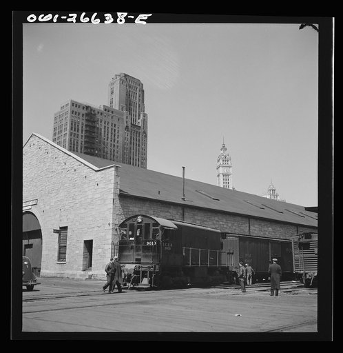 Untitled photo, possibly related to: Chicago, Illinois. Diesel switch engine working at the South Water Street, Illinois Central Railroad freight terminal
