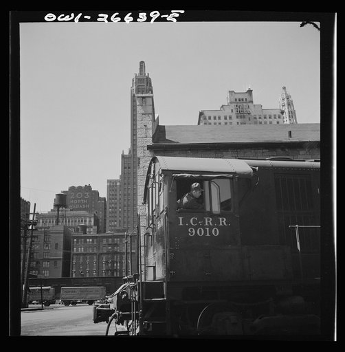 Untitled photo, possibly related to: Chicago, Illinois. Diesel switch engine working at the South Water Street, Illinois Central Railroad freight terminal