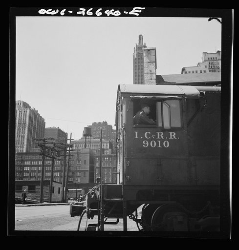 Untitled photo, possibly related to: Chicago, Illinois. Diesel switch engine working at the South Water Street, Illinois Central Railroad freight terminal