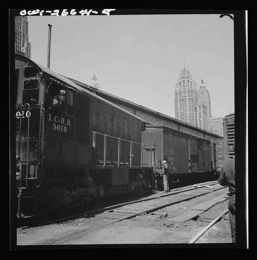 Untitled photo, possibly related to: Chicago, Illinois. Diesel switch engine working at the South Water Street, Illinois Central Railroad freight terminal
