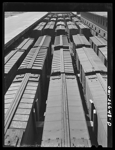 Chicago, Illinois. Chicago, Milwaukee, Saint Paul and Pacific Railroad cars at the freight depot
