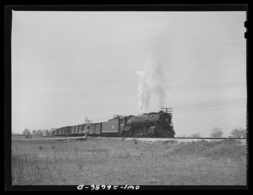 Bensenville, Illinois. A redball west coast freight train leaving the Bensenville yard of the Chicago, Milwaukee, Saint Paul and Pacific Railroad