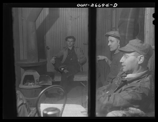 Chicago, Illinois. Switchmen in their shanty at the South Water Street Illinois Central Railroad freight terminal