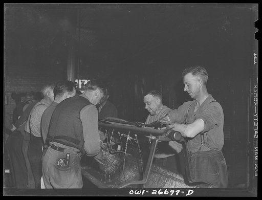 Clinton, Iowa. Chicago and Northwestern Railroad roundhouse workers washing up at the end of a day's work
