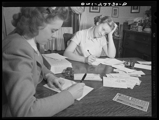 Niagara Falls, New York. Nan Hannegan, nineteen-year old chemical operator at the Niacet Chemical Company, and a friend writing letters