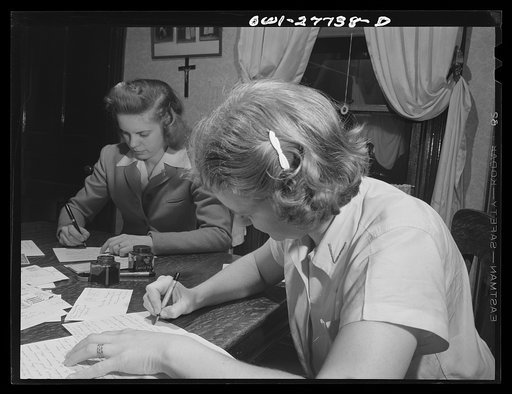 Niagara Falls, New York. Nan Hannegan, a nineteen-year old chemical operator at the Niacet chemical company, and a friend writing letters