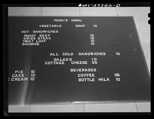 Bell Aircraft Corp., Niagara Falls, New York. Menu on the wall of the employees' cafeteria which is plant-operated. Hot food is now served in sandwiches. Eventually facilities will be provided on moving wagons throughout the cafeteria for more hot food