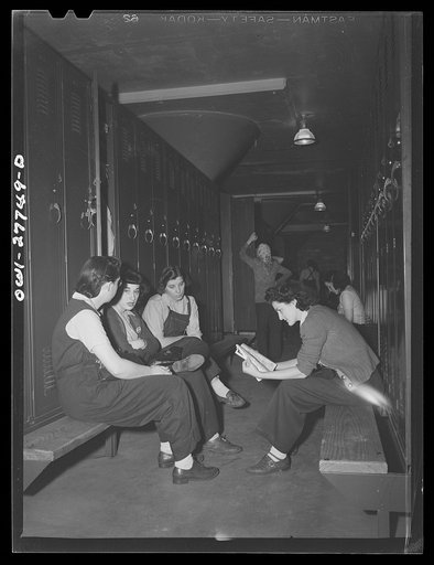 Bell Aircraft Corporation, Niagara Falls, New York. Women employees in the locker room waiting for their shift to begin