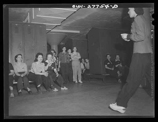 Untitled photo, possibly related to: Bell Aircraft Corporation, Niagara Falls, New York. Women employees in the locker room waiting for their shift to begin
