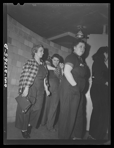 Bell Aircraft Corporation, Niagara Falls, New York. Women going to work at 4:30 p.m.