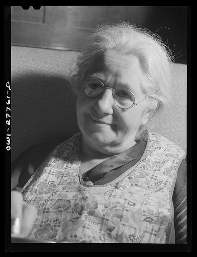 Untitled photo, possibly related to: Niagara Falls, New York. Mrs. Hannegan runs a boardinghouse for from six to ten girls working in war plants. She is the mother of eleven children, loves people, and feels that this is the best way to contribute to the war effort. Girls pay eight dollars a week, i