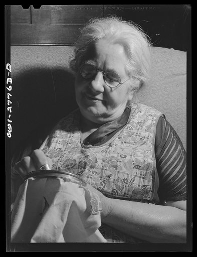 Untitled photo, possibly related to: Niagara Falls, New York. Mrs. Hannegan runs a boardinghouse for from six to ten girls working in war plants. She is the mother of eleven children, loves people, and feels that this is the best way to contribute to the war effort. Girls pay eight dollars a week, i