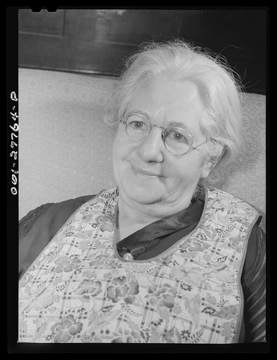 Niagara Falls, New York. Mrs. Hannegan runs a boardinghouse for from six to ten girls working in war plants. She is the mother of eleven children, loves people, and feels that this is the best way to contribute to the war effort. Girls pay eight dollars a week, including meals; her daughter Nan pays