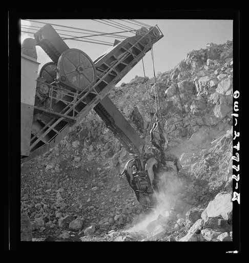 Morenci, Arizona. An electric shovel operating in an open-pit copper mine of the Phelps Dodge mining corporation