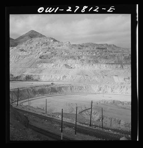 Untitled photo, possibly related to: Morenci, Arizona. AN ore train being loaded at one of the open-pit copper mines of the Phelps Dodge mining corporation